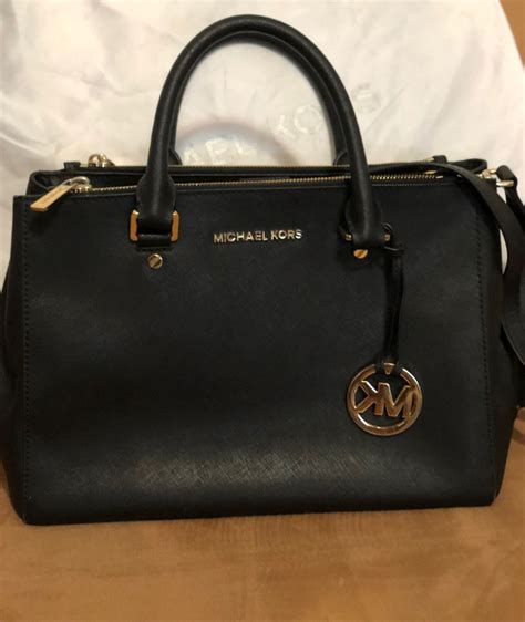 como saber que una bolsa michael kors es original|More.